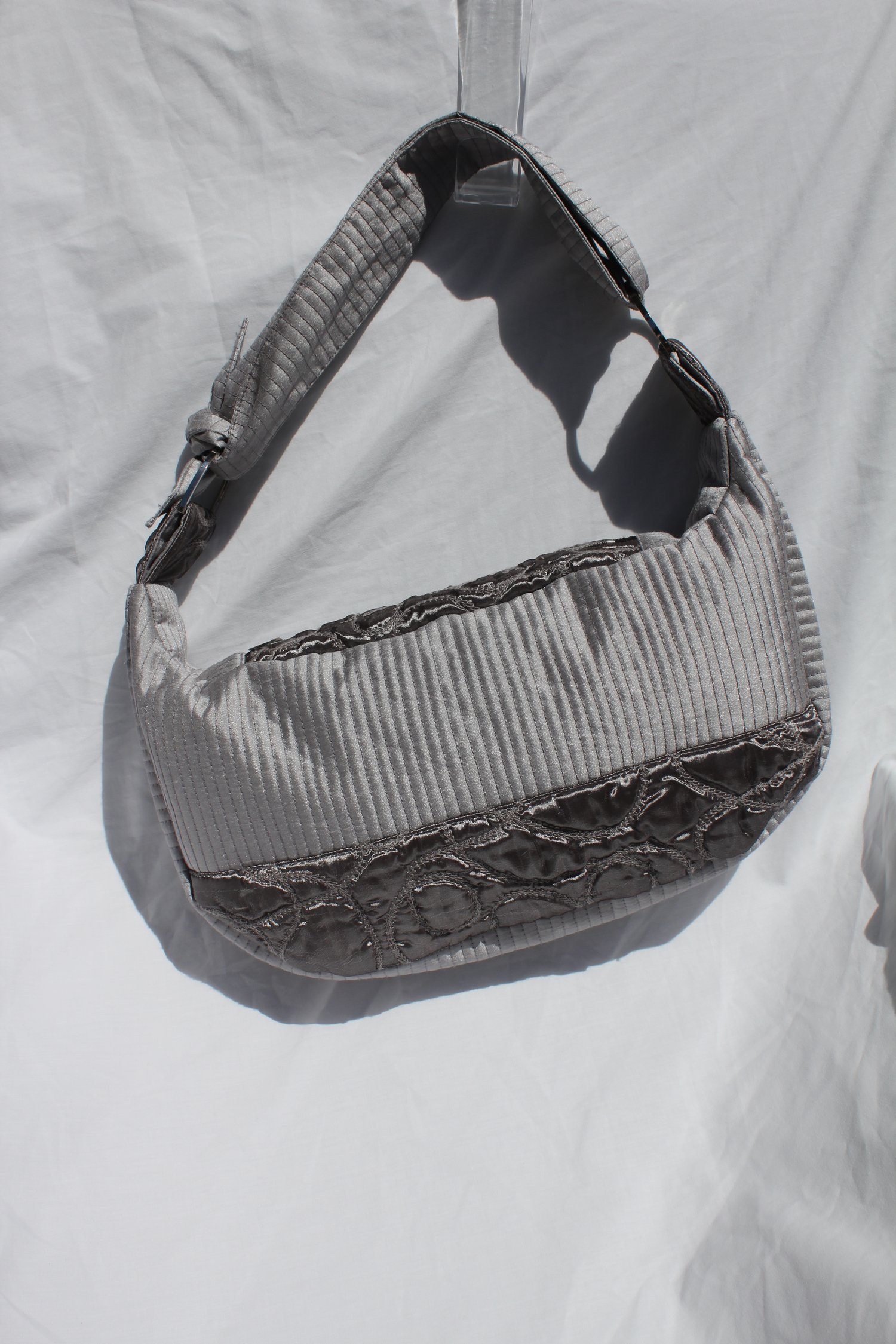 Image of 'vessel to hold your baggage' 001 - small quilted silver