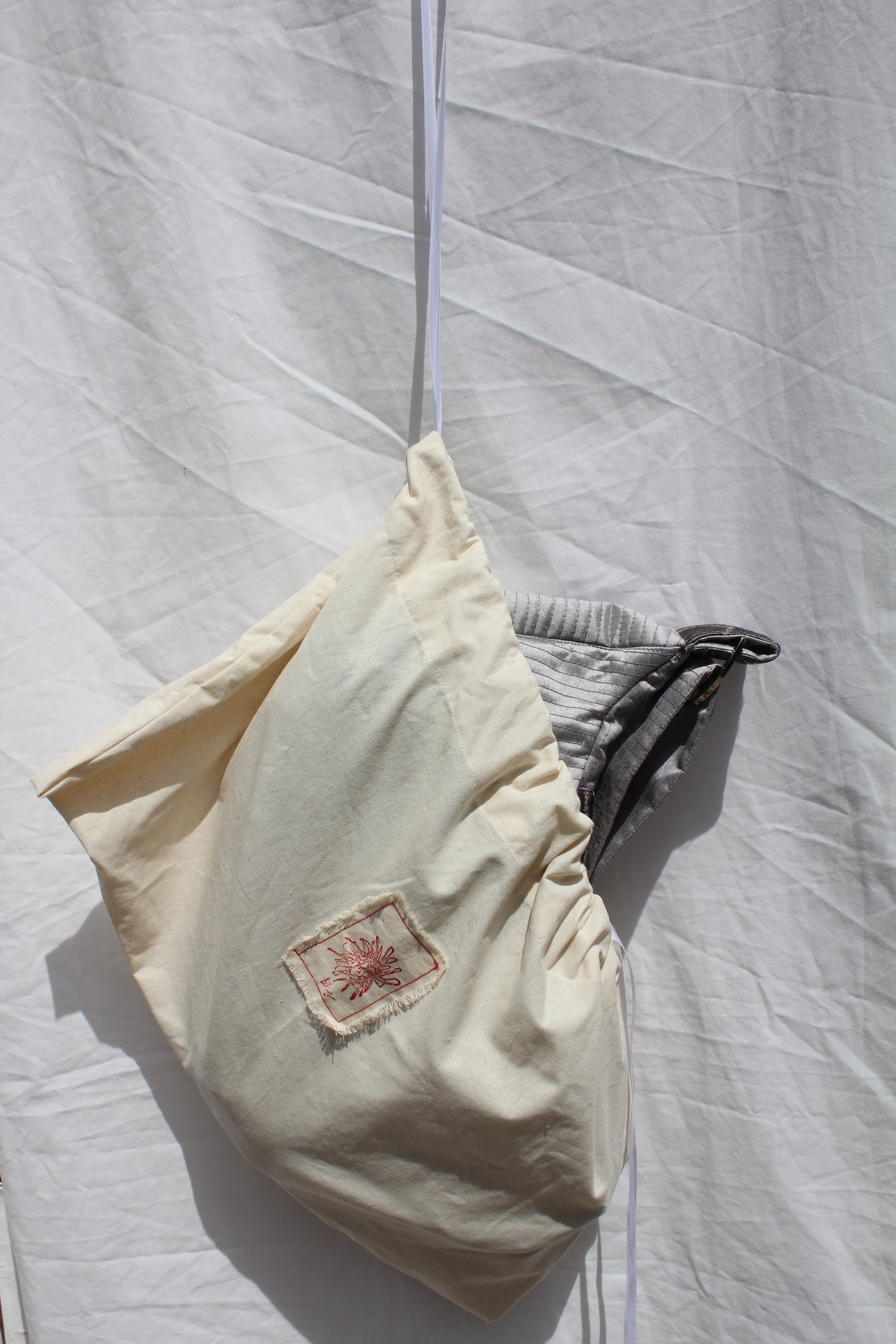 Image of 'vessel to hold your baggage' 001 - small quilted silver