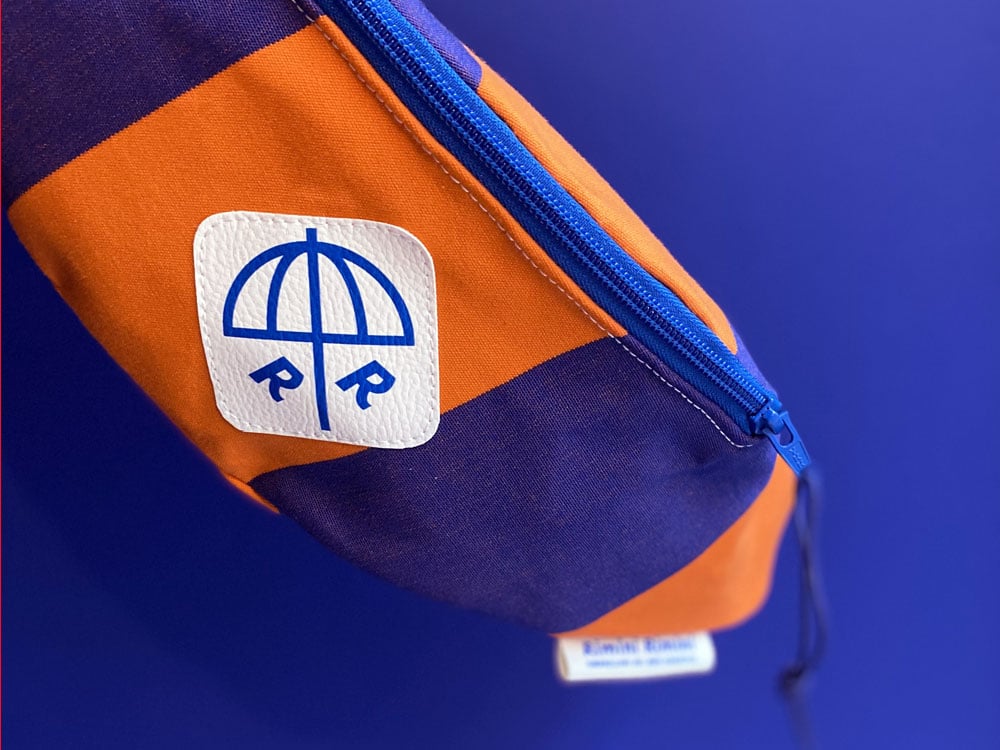 Image of FANNY PACK Gabicce Stripes Orange / Lilac