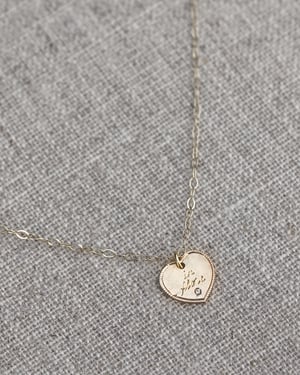 Image of 9ct gold Latin engraved Heart necklace with diamond