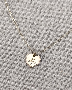 Image of 9ct gold Latin engraved Heart necklace with diamond