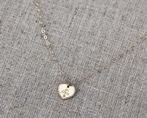 Image of 9ct gold Latin engraved Heart necklace with diamond