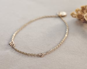 Image of *Sample Sale - was £245* 9ct gold ‘Pace’ engraved disc bracelet with ruby.