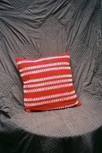 Image 2 of red and white cushion