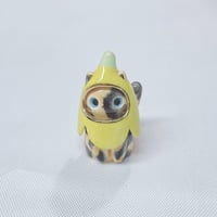 Image 1 of Banana Tortie Cat Ceramic Figurine 