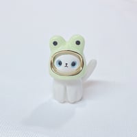 Image 1 of White kitty with frog hat ceramic figurine