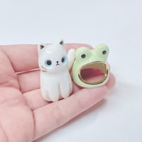 Image 4 of White kitty with frog hat ceramic figurine