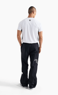 Image 4 of MALBON X UNDEFEATED RAIN PANT [2024]