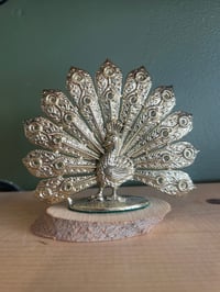 Metal peacock earring holder 