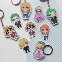 Image 1 of One Piece keychains and stickers