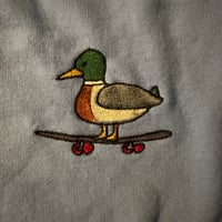 Image 2 of duck on a skateboard sweater