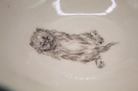 Image 1 of very eepy plate or bowl 