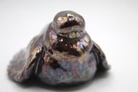 Image 4 of doomer pigeon with a cig sculpture 