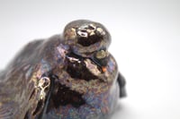 Image 1 of doomer pigeon with a cig sculpture 