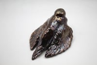 Image 5 of doomer pigeon with a cig sculpture 