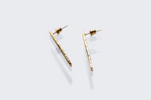 Image of long plain gold plated silver earrings with inscription in Latin