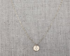 Image of 9ct gold Latin engraved round disc necklace with diamond