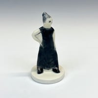 Image 1 of Action(less) Figure with Black Dress