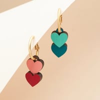 Image 1 of Pendientes reversibles Flip Hearts de Materia Rica