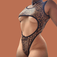 Image 1 of The REVOLUTION bodysuit in wet look leopard