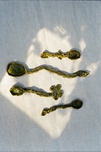 Image 1 of spoons for spells 