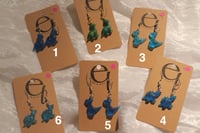 Image 2 of dinosaur earrings 