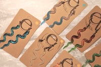 Image 3 of longish snake earrings, structured & unstructured