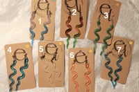 Image 2 of longish snake earrings, structured & unstructured