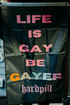 "LIFE IS GAY BE GAYER" COLOR WALL FLAG
