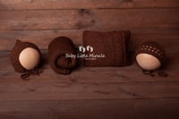 Image 1 of Knitted pillow wrap and bonnets set brown
