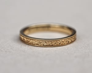 Image of 18ct Yellow gold, 3mm Flat court Laurel Leaf and Milled edge engraved ring