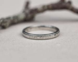 Image of  Platinum 3mm,  Latin engraved milled edge ring