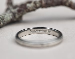 Image of  Platinum 3mm,  Latin engraved milled edge ring