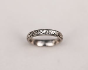 Image of 18ct White gold, 4mm Floral and milled edge engraved ring