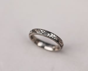 Image of 18ct White gold, 4mm Floral and milled edge engraved ring