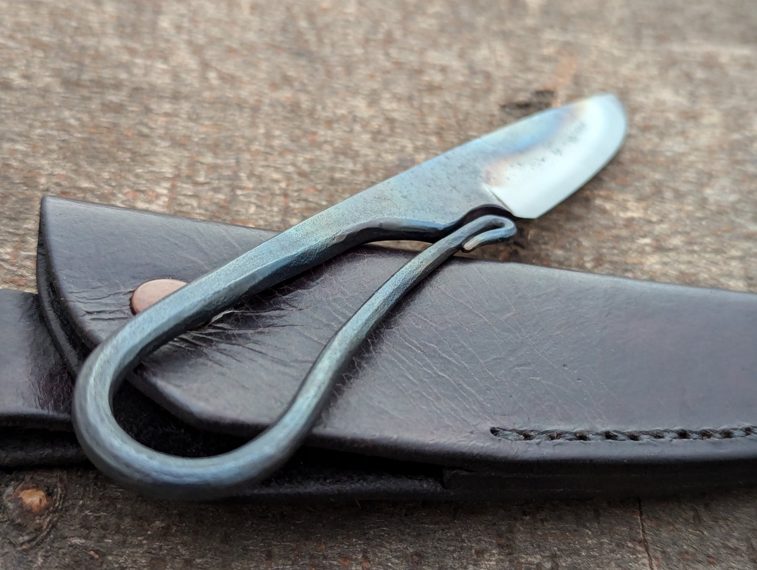 Image of Integral handle knife with swoopy ricasso area