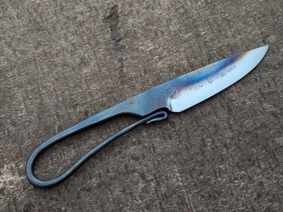 Image of Integral handle knife with swoopy ricasso area