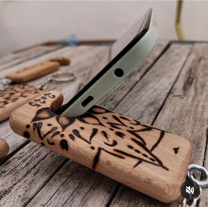 Image of Llavero-soporte para el móvil.