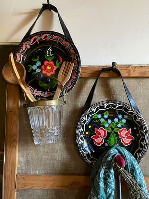 Image of folk art hanging plate collection