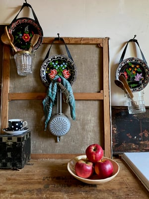 Image of folk art hanging plate collection