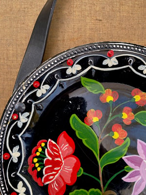 Image of folk art hanging plate collection