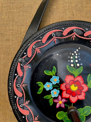 Image of folk art hanging plate collection