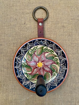 Image of latin style hanging plate collection