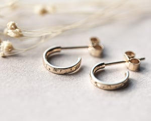 Image of 9ct gold ‘Star’ Engraved hoop earrings.