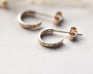 Image of 9ct gold ‘Star’ Engraved hoop earrings.