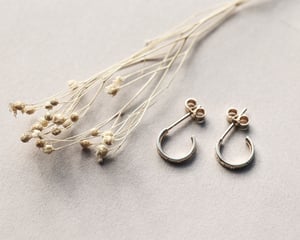 Image of 9ct gold ‘Star’ Engraved hoop earrings.