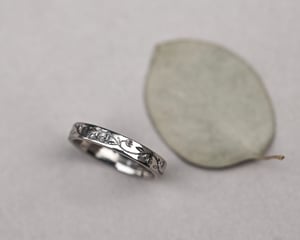 Image of  18ct White gold  3mm flat court 'Snowdrop' engraved ring.