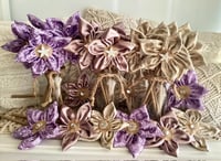 Image 1 of Memory Flowers custom created for a client from jackets hand tailored by her cherished friend
