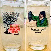 Image 1 of RETURN OF THE LIVING DEAD II "THE DEAD BITE" 14 OZ TERROR-VISION COLLECTOR'S GLASS
