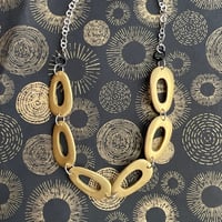 Gold oval pieced necklace No. 1